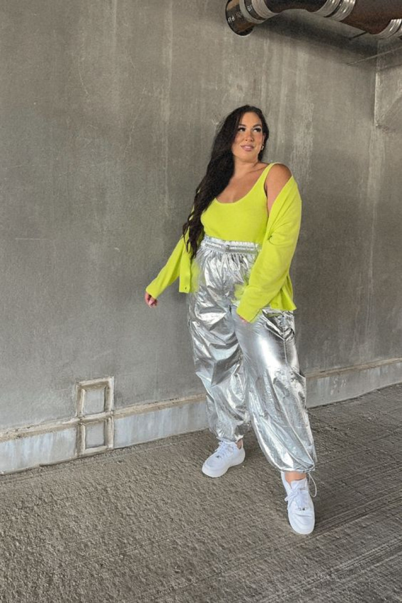 silver pants with neon top