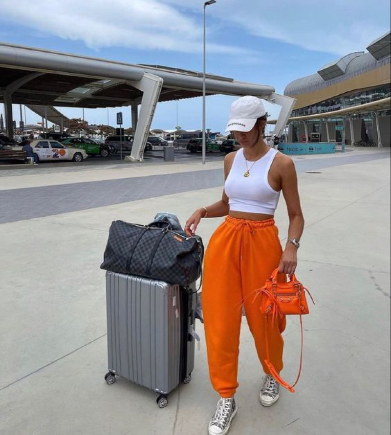 White Sleeveless Crop Top, Orange Sweat Pant, Airport Outfits