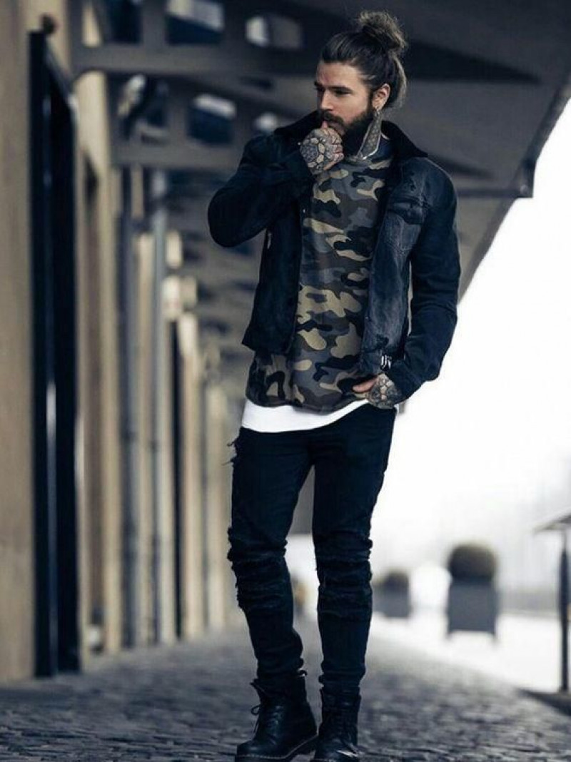 sleek camo jacket and black denim