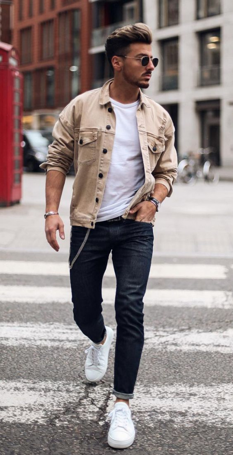 beige denim jacket and dark jeans