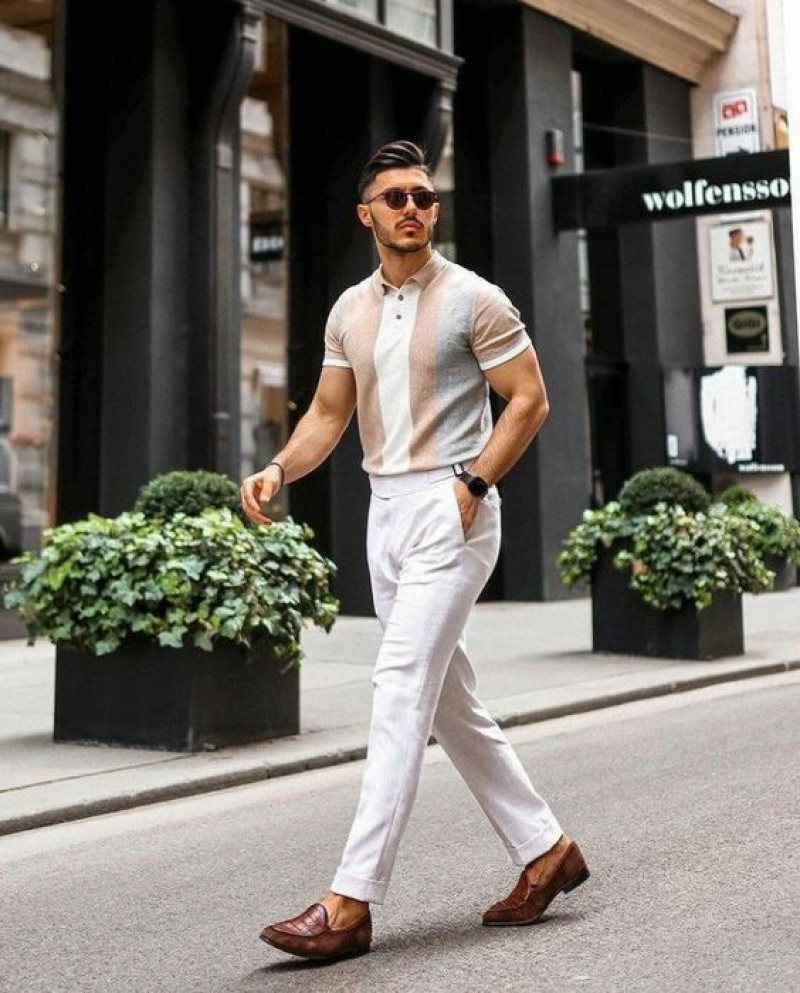 White ivory polo and matching white trousers