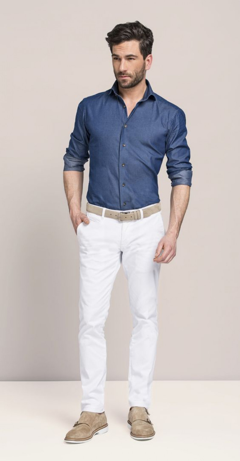dark blue shirt and snowy white trousers
