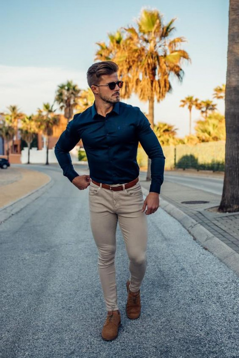 dark blue shirt and camel pants